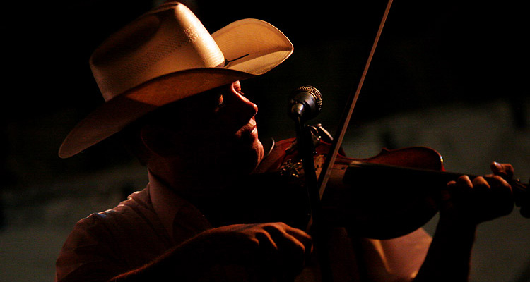 Anthony Wilson performs at the 11th Street Cowboy Bar.