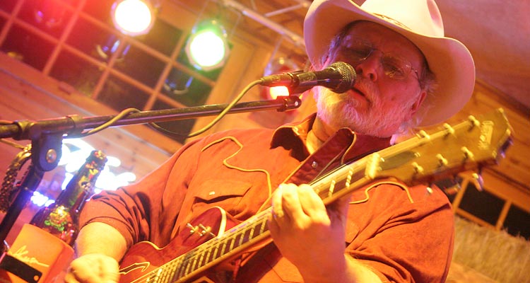 Tommy Alverson performs at the 11th Street Cowboy Bar Christmas Party.